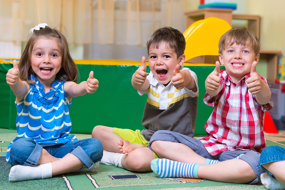 Young children playing with educational toys